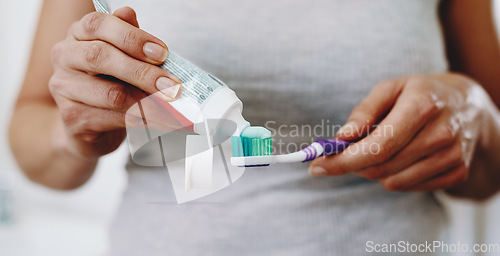 Image of Hands, toothpaste and woman toothbrush to clean teeth for hygiene, care and dental wellness in morning routine. Person, dentistry and cosmetic healthcare or mouth cleaning, whitening and selfcare