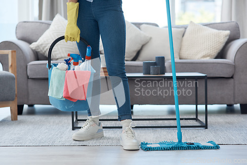 Image of Bucket, mop and person with product for cleaning, housework and chores in a house. Start, lifestyle and a cleaner with tools to clean the living room, mopping and apartment hygiene in a home