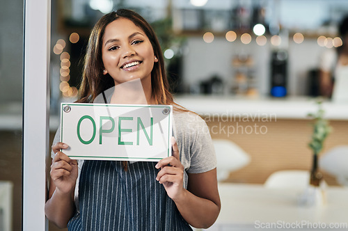 Image of Happy woman, open sign and portrait of cafe owner, small business or waitress for morning or ready to serve. Female person or restaurant server holding board for coffee shop or cafeteria opening