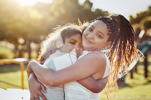 Image of Woman hug young girl outdoor, smile in portrait and love, bonding in park with happiness and care. Relationship, mother and daughter spending quality time together with embrace, affection and family