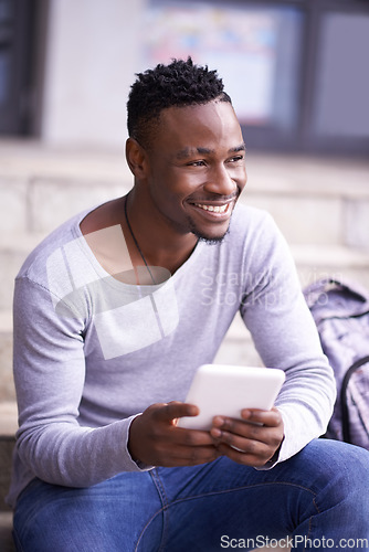 Image of Smile, college and tablet with black man on stairs for learning, education or research. Network, social media and technology with male student on steps of university campus for app, digital or study