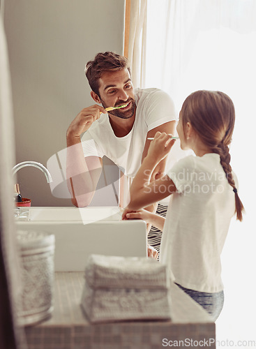 Image of Brushing teeth, father learning and child in a bathroom at home in morning with dental cleaning. Oral hygiene, kids and dad together in house with bonding and parent love for children with toothbrush