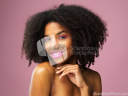 Image of Face, hair care and smile of black woman with makeup in studio isolated on pink background for skincare. Hairstyle portrait, lipstick cosmetics and African female model with salon treatment for afro.