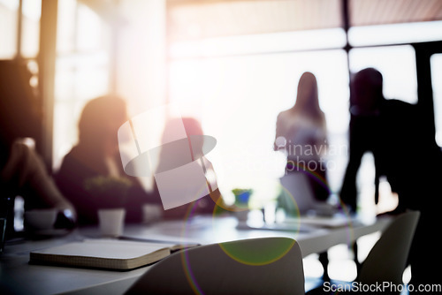 Image of Discussion, planning and business people in the office brainstorming for a corporate project in collaboration. Teamwork, meeting and blur of group of employees working together in workplace boardroom