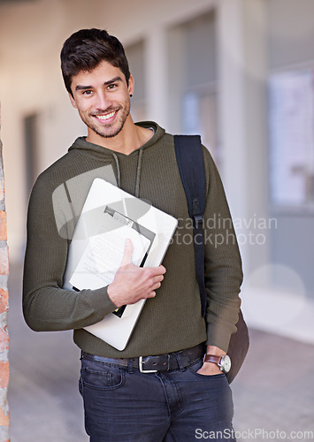 Image of Laptop, books and student or man portrait for learning, education and studying for university at outdoor campus. Happy person with technology, study resources and college, knowledge or scholarship