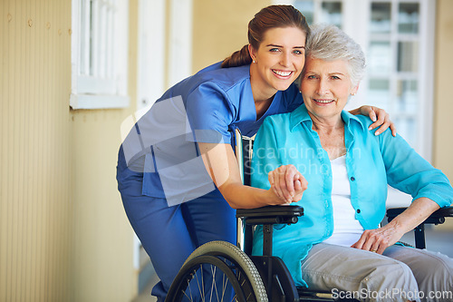 Image of Portrait, caregiver or old woman in a wheelchair in hospital helping an elderly patient for support in clinic. Happy, medical or healthcare social worker talking to a senior person with a disability