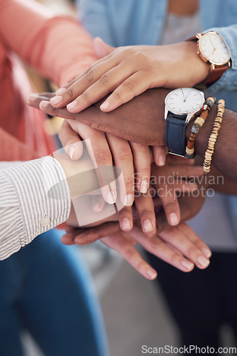 Image of Hands together, team building and trust with diversity, collaboration and creative group at startup. Motivation, solidarity and support with teamwork, hand stack for a goal with people in community