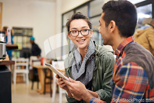 Image of Love, smile and couple with a tablet, cafe and talking with connection, social media and share ideas. Partners, man or woman with happiness, coffee shop or technology for online reading or search web