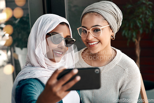 Image of Selfie, muslim women and friends smile in city for social media, influencer content creation or fashion blog. Young gen z people in Saudi Arabia for profile picture, online photography and sunglasses