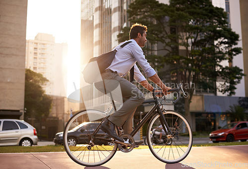 Image of Morning, bicycle and business man in city for moving, commute and carbon neutral transportation. Travel, sustainability and cycling with male employee in urban town for journey, energy and transit