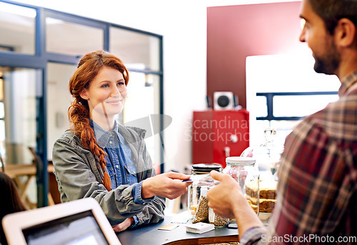 Image of Woman smile, customer and credit card at a coffee shop for payment with a order at restaurant. Female person, happiness and diner to pay and buy at cafe with male store assistant and barista