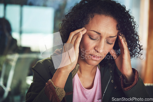 Image of Anxiety, mature black woman with headache or stress and at home. Depression or burnout, mental health or healthcare and exhausted or tired female with hands on head at her house background