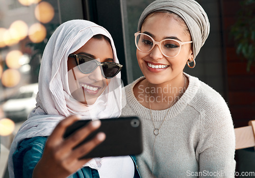 Image of Selfie, happy muslim and women or friends in city for social media, influencer content creation and fashion blog. Young gen z people in Saudi Arabia with profile picture, photography and sunglasses