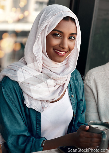 Image of Muslim woman, coffee shop and portrait for happy customer, morning relax and restaurant. Face of young islamic person in hijab with tea, latte or drink at cafe for hospitality industry