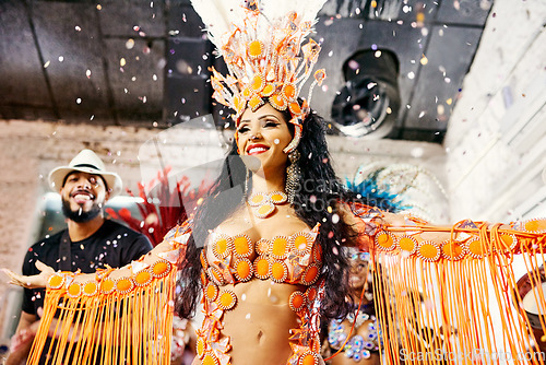 Image of Samba, music and dance with woman at carnival for celebration, party and festival in Rio de Janeiro. Confetti, show and creative with brazil girl for performance, new year and culture event