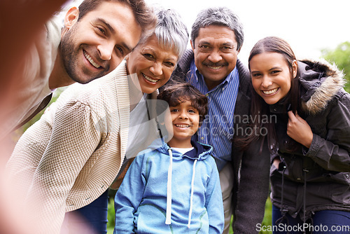 Image of Selfie, love and portrait of a big family on an outdoor adventure, travel or journey together. Happy, smile and boy child taking picture with his grandparents and parents while on holiday or vacation