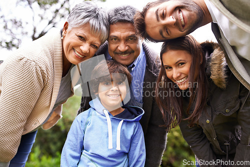 Image of Happy, smile and portrait of a big family in nature on adventure, travel or journey together. Love, bonding and boy child with his grandparents and parents while on holiday, weekend trip or vacation.