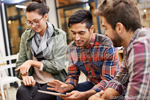 Image of Tablet, people in a meeting at cafe or coffee shop with tablet and talking about startup ideas. Teamwork or collaboration, technology and students or friends together in discussion about project