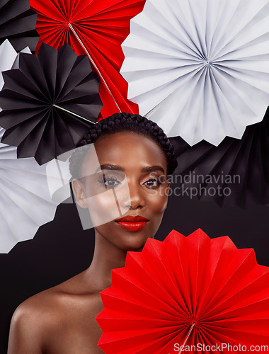 Image of Portrait, beauty and black woman with origami fans, cosmetics and artistic girl against black background. Face, female person or model with paper art, creativity or skincare with design and confident