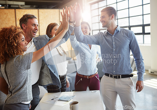 Image of High five, motivation and business people in a meeting with support, success or team building. Happy, mission and corporate employees in celebration of an achievement with a gesture in office