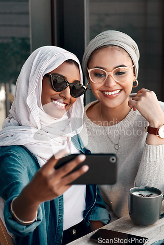Image of Coffee shop, couple of friends and selfie for social media, customer experience or influencer content creation. Gen z people or young islamic women, profile picture photography and cafe or restaurant