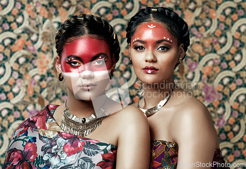 Image of Art, culture and portrait of women with makeup for tradition on a studio background or wall. Fashion, celebration and friends or family with creative, traditional and artistic cosmetics together