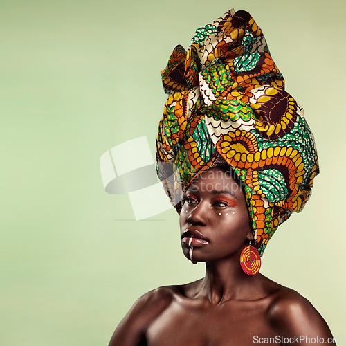 Image of Beauty, black woman and cosmetics with African turban and makeup with mockup. Isolated, green background and young female person thinking with a traditional hair scarf with confidence and culture