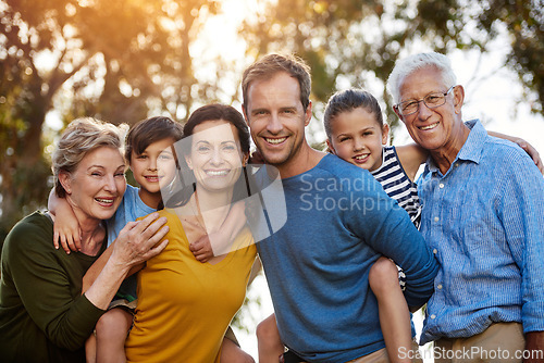 Image of Portrait, outdoor and family with love, smile and bonding with fun, caring and happiness together. Face, happy grandparents and mother with father, children and kids in nature, playful and loving