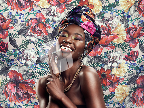 Image of Head wrap, flowers and black woman with fashion, cheerful and happiness against floral background. Funny, happy model and female person with a turban, stylish and trendy with joy, smile and confident