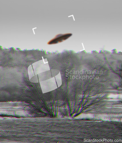 Image of UFO, alien and camcorder on a camera screen to record a flying saucer in the sky over area 51. Viewfinder, motion blur and conspiracy with a spaceship on a recording device display outdoor in nature
