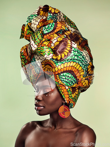 Image of Beauty, black woman and fashion cosmetics with African head wrap and makeup with mockup. Isolated, green background and young female person with a traditional hair scarf with confidence feeling relax