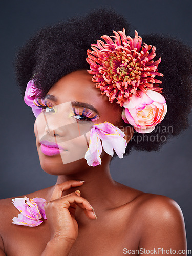 Image of Makeup, flowers and smile with portrait of black woman for beauty, creative and spring. Natural, cosmetics and floral with face of model isolated on studio background for art, self love or confidence