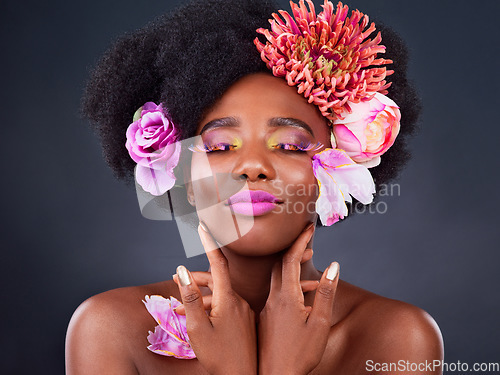 Image of Makeup, flowers and beauty with black woman in studio for color, creative and spring. Natural, cosmetics and floral with african model isolated on background for art, self love or confidence