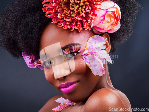 Image of Makeup, flowers and spring with portrait of black woman for beauty, creative and art. Natural, cosmetics and floral with face of model isolated on studio background for color, self love or confidence