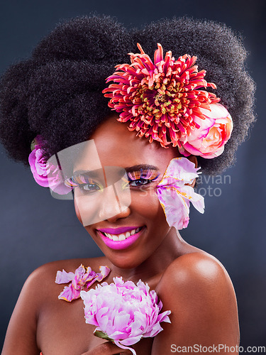 Image of Makeup, flowers and happy with portrait of black woman for beauty, creative and spring. Natural, cosmetics and floral with face of model isolated on studio background for art, self love or confidence