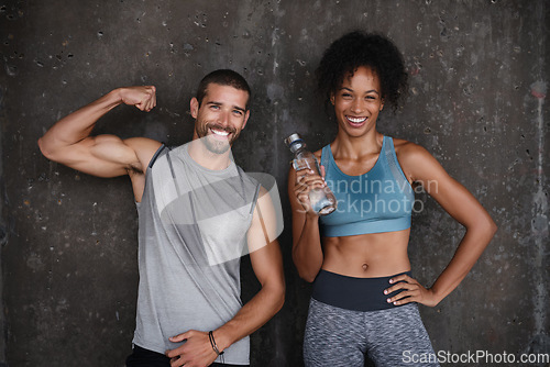 Image of Fitness, muscle flex and portrait of couple in city after workout, body builder training and exercise. Sports, water bottle and man and woman sweating after running for endurance, wellness and energy