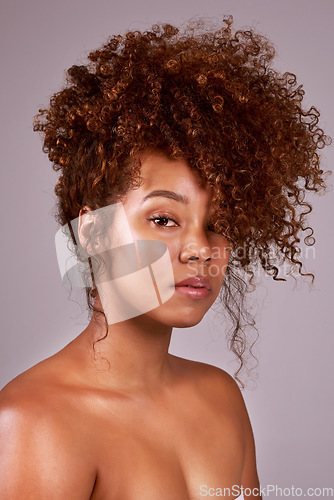 Image of Beauty, skincare and curly hair with portrait of woman in studio for clean, cosmetics or natural makeup. Facial, model and glow with female model isolated on background for mockup, self care or shine