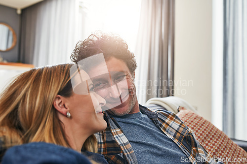 Image of Face of couple, smile and relax in living room for quality time, love and care of support together at home. Happy man, mature woman and bonding on sofa for break, happiness or loyalty to life partner