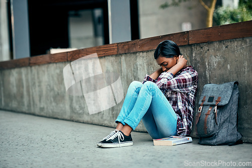 Image of Woman, stress and student outdoor, university and mental health issue with burnout, overworked and deadline. Female person, academic and girl on the ground, sad and college with education and anxiety