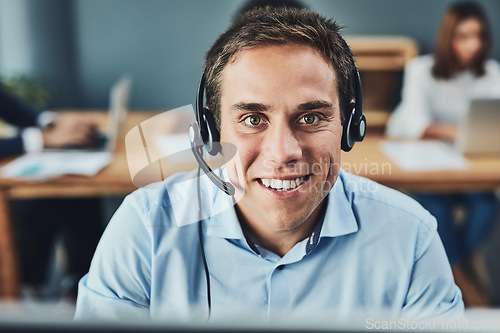 Image of Businessman, call center and portrait smile for customer service, support or telemarketing at the office. Man employee, consultant or agent smiling for online advice, help or assistance in contact us