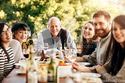 Image of Food, portrait and family eating together at table to celebrate holiday, Christmas or thanksgiving. People or friends group outdoor with senior parents and sharing lunch and drinks in summer garden