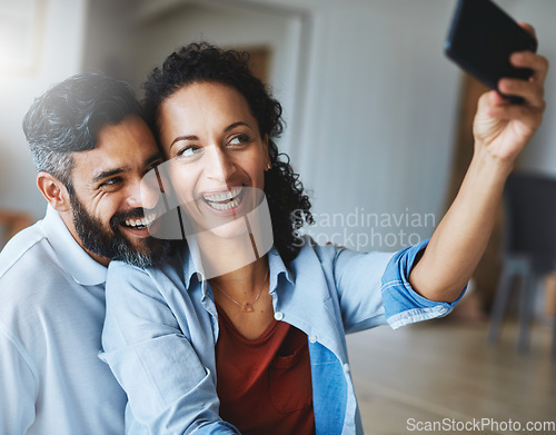 Image of Happy couple, smile and selfie for profile picture, social media or vlog together relaxing at home. Man and woman in relationship smiling for photo, online post or memory and bonding in living room