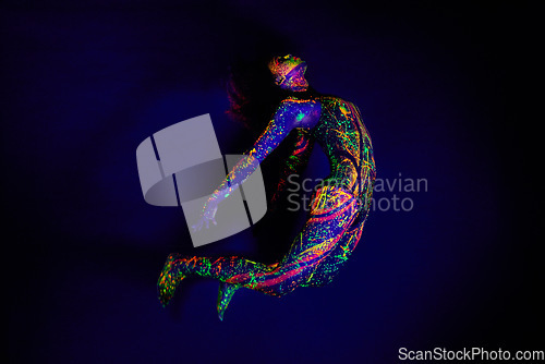 Image of Woman, neon paint and dancer jump on dark background for creative performance, splatter texture and psychedelic fantasy. Body artist, color splash and unique glow in surreal circus on mockup studio