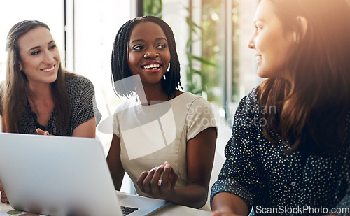 Image of Business women, conversation and laptop data with planning and strategy in office. Training, communication and online chart with corporate tech and working on a teamwork project with diversity