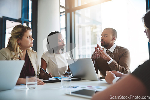 Image of Business people, tech conversation and laptop data with planning and strategy in office. Training, communication and online job with management and working on a teamwork project with diversity