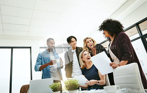 Image of Teamwork, office and excited business people in meeting for collaboration, planning and success. Marketing agency, diversity and men and women happy with documents, sales report and proposal at desk