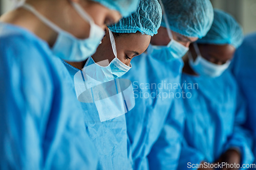 Image of Healthcare, group of surgeons working a medical operation and in a hospital building. Teamwork or collaboration, surgery and medic team or doctors with scrubs on with focus at clinic.