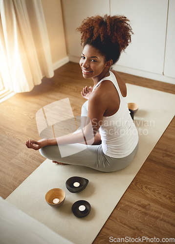 Image of Calm woman, meditation and portrait in yoga for spiritual wellness or healthy exercise at home. Happy female yogi relaxing or meditating on mat with smile for mental wellbeing, health or awareness