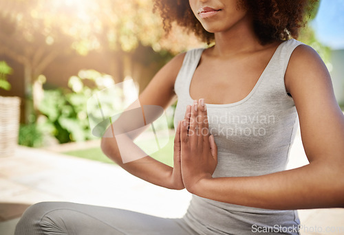 Image of Woman, hands and yoga in meditation for health, spiritual wellness or zen workout and exercise on mat at home. Hand of calm female meditating for peace, mind and chakra for healthy fitness or balance