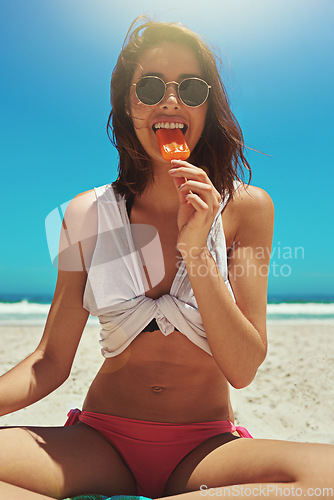 Image of Ice cream, beach sunglasses and woman portrait on holiday by the sea and blue sky with happiness. Sun, sand and young female person face with eating and lens flare by the ocean in summer on vacation